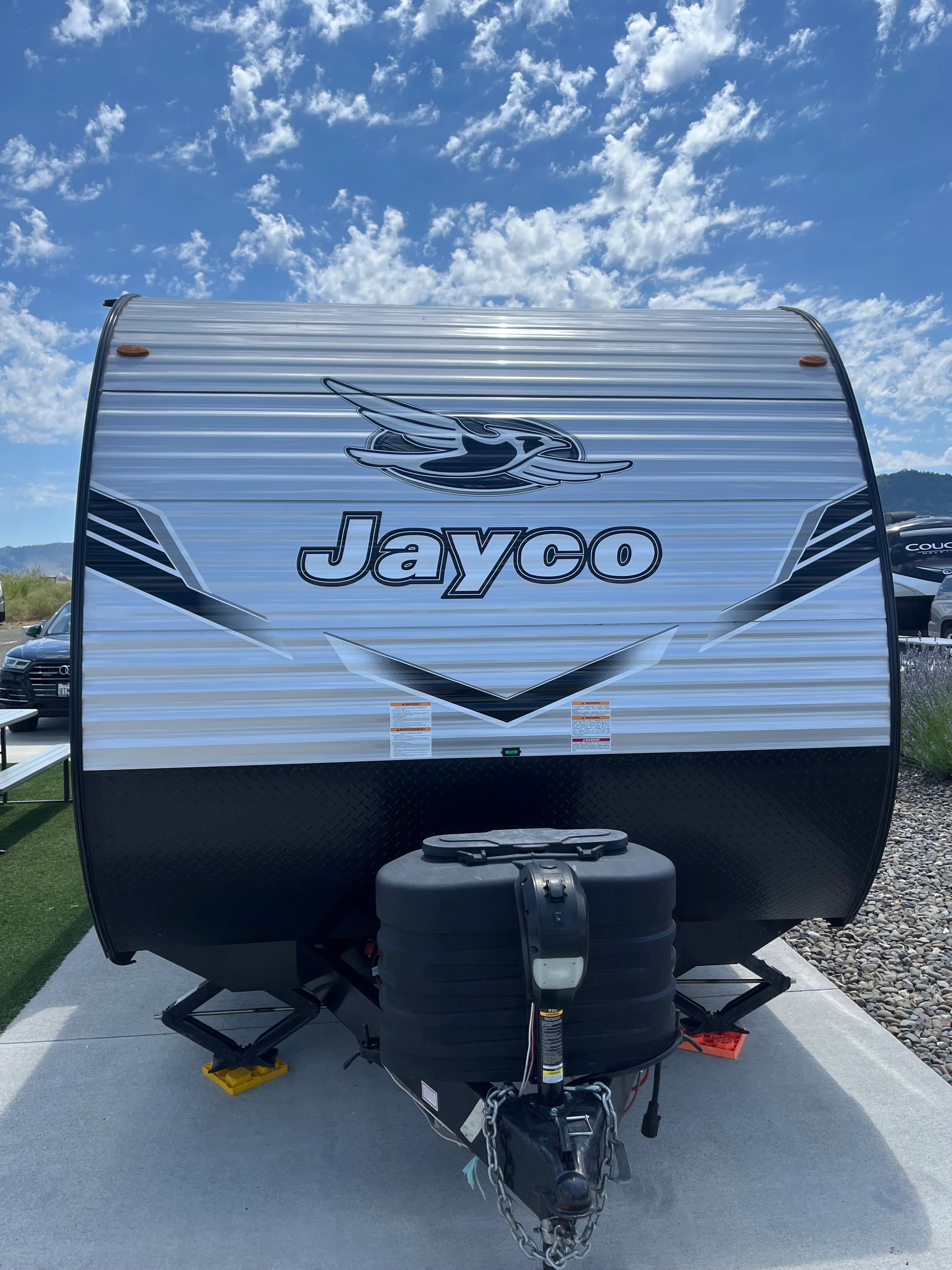 Close view of the front cap with Jayco logo and hitch assembly