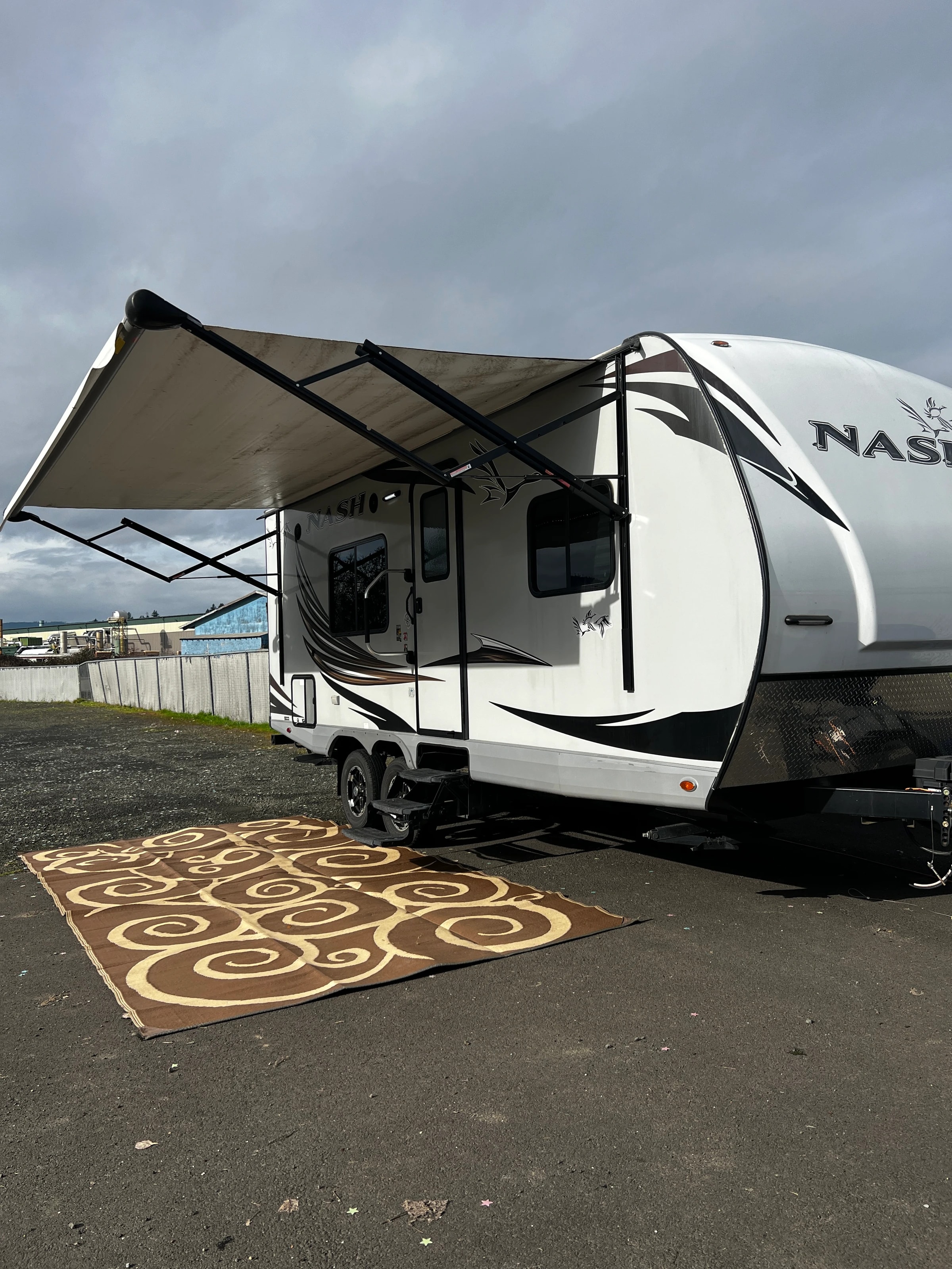 The Nash under its awning on the patio mat