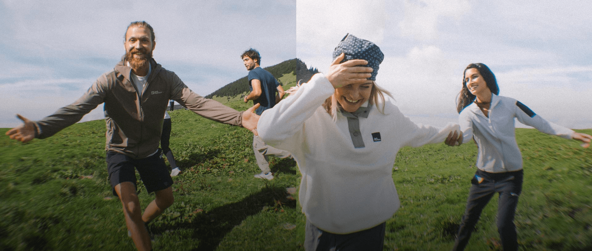 Walkers in fleeces and softshells running across a green hillside