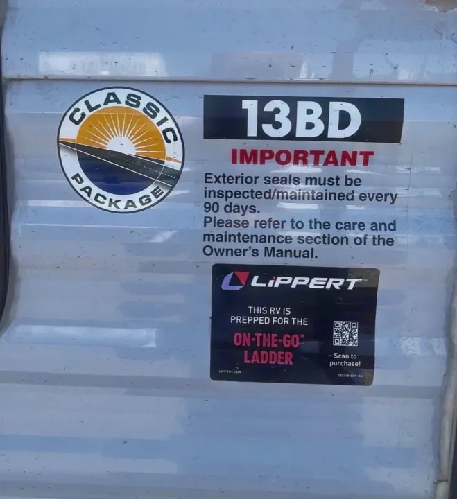 Close-up of the exterior badge showing model 13BD and Classic Package decal
