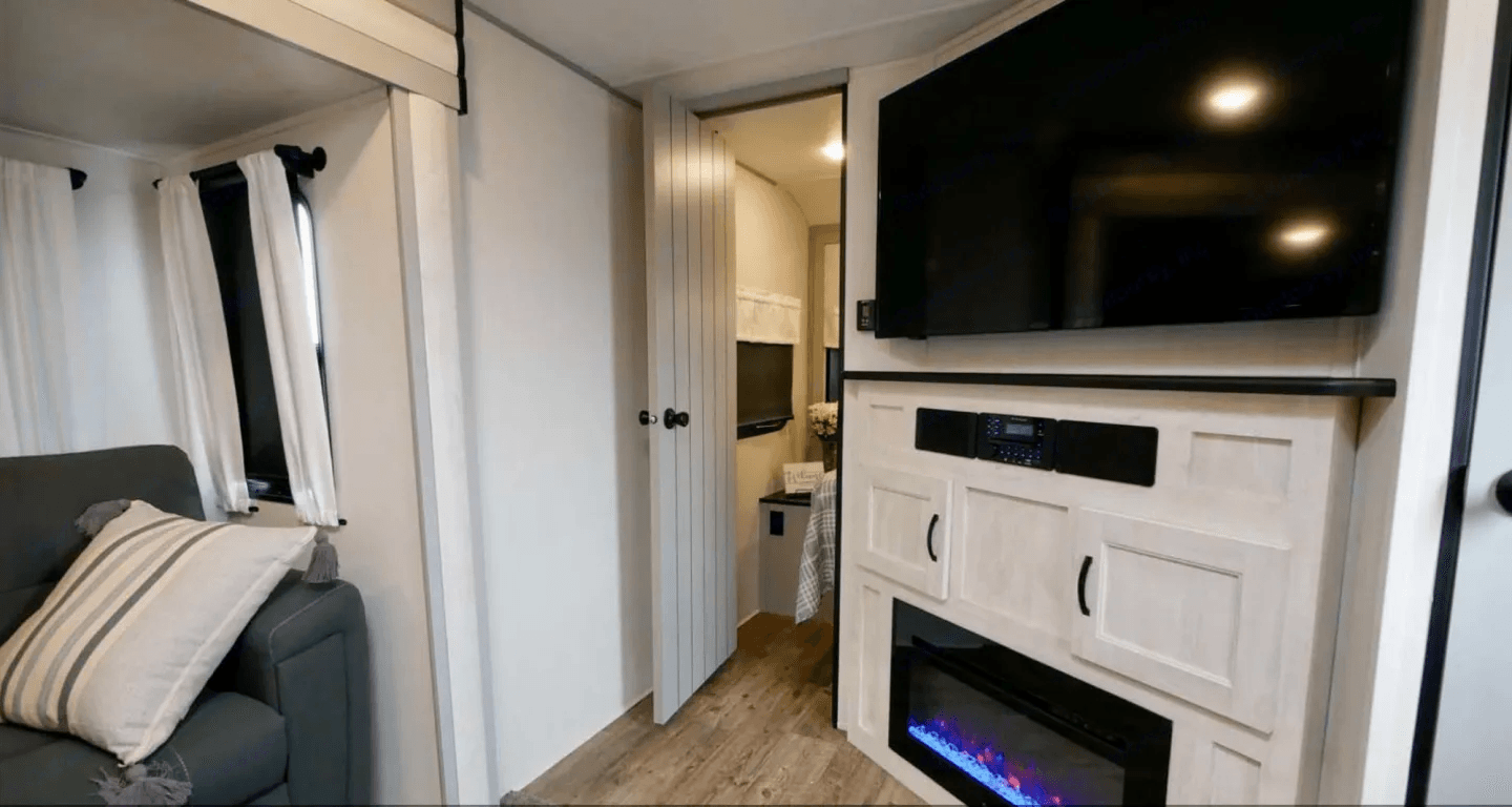 Living area with cabinets and a television