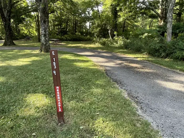 E153