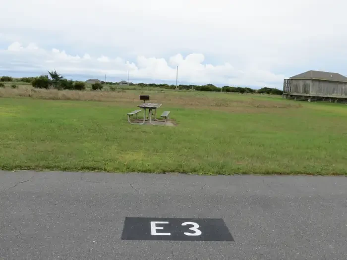 E003
