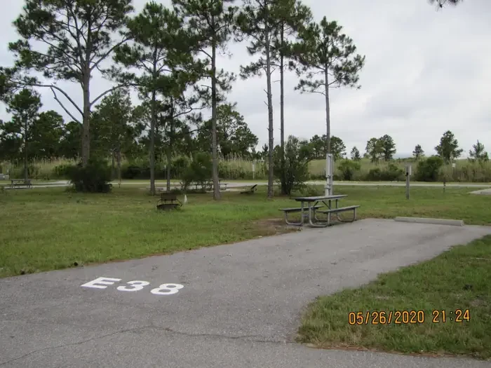 E038